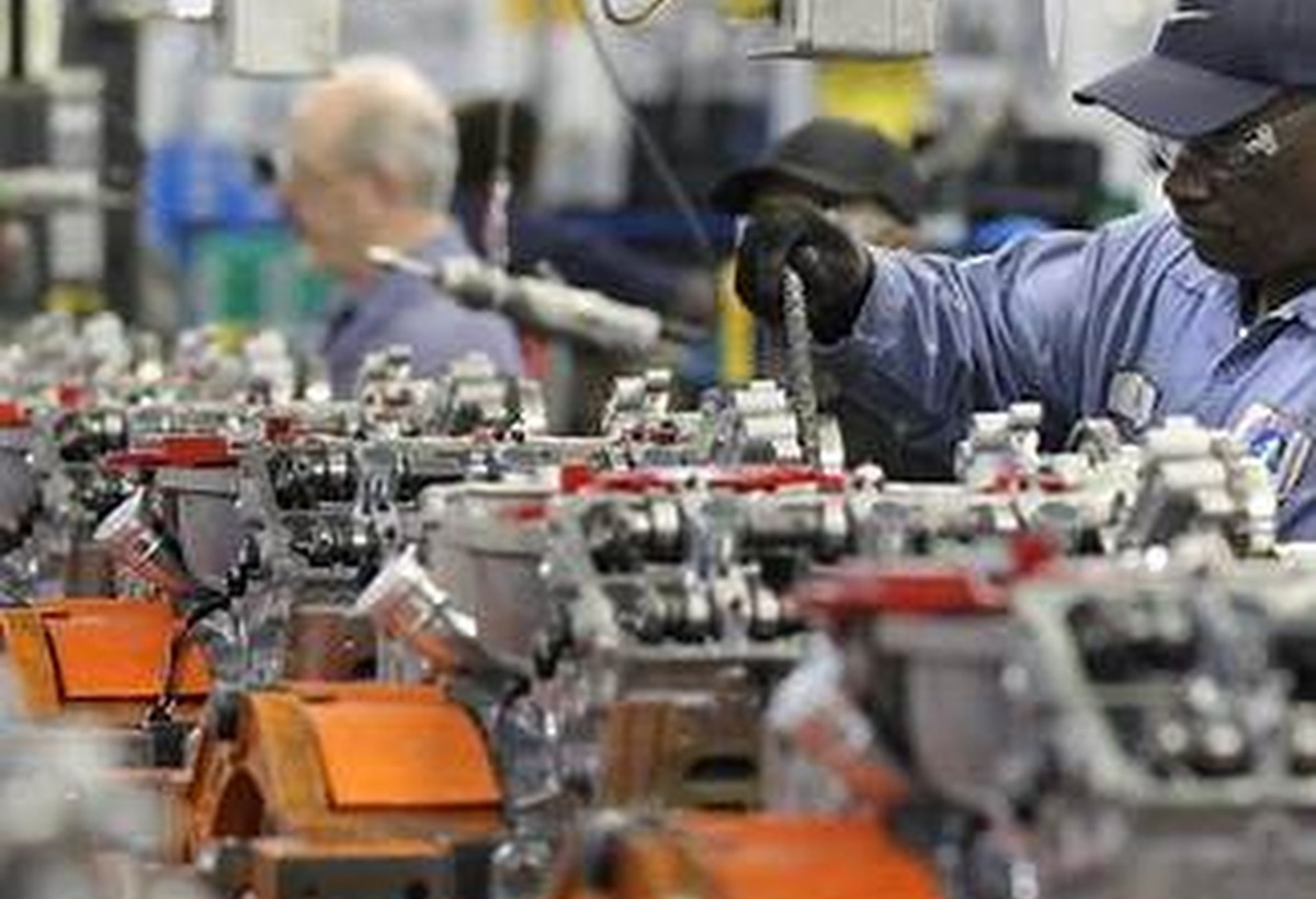 Factory production environment representing industrial operations, labor, and manufacturing site requirements